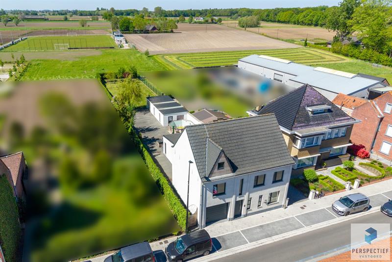 Ruime, instapklare woning met 4 slaapkamers, garage en magazijn op 970 m² - 28