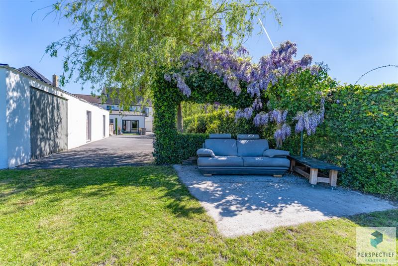 Ruime, instapklare woning met 4 slaapkamers, garage en magazijn op 970 m² - 6