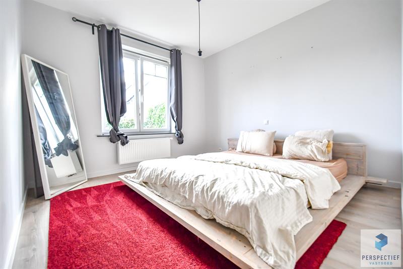 Ruim gelijkvloers appartement met 2 slaapkamers, voor- én achtertuin met terras & mogelijkheid tot aankoop staanplaats - 10