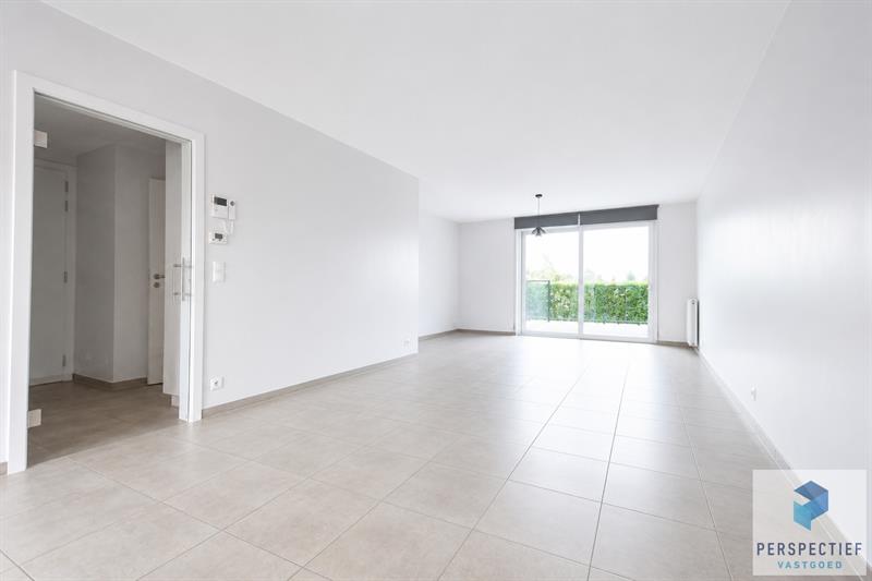 Ruim gelijkvloers appartement met 2 slaapkamers, voor- én achtertuin met terras & mogelijkheid tot aankoop staanplaats - 6