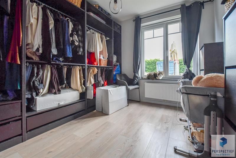 Ruim gelijkvloers appartement met 2 slaapkamers, voor- én achtertuin met terras & mogelijkheid tot aankoop staanplaats - 13