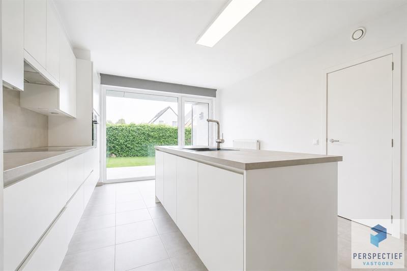 Ruim gelijkvloers appartement met 2 slaapkamers, voor- én achtertuin met terras & mogelijkheid tot aankoop staanplaats - 8