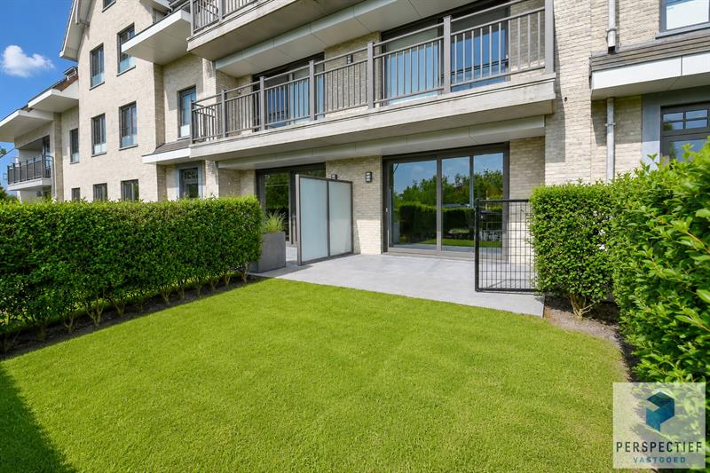 Ruim gelijkvloers appartement met 2 slaapkamers, voor- én achtertuin met terras & mogelijkheid tot aankoop staanplaats - 3