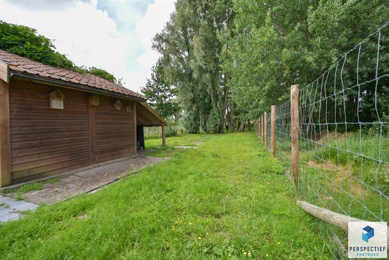Landelijk gelegen ruime woning met tuin, kleine weide & bijgebouw gelegen in Oedelem op  1 365 m² - 29
