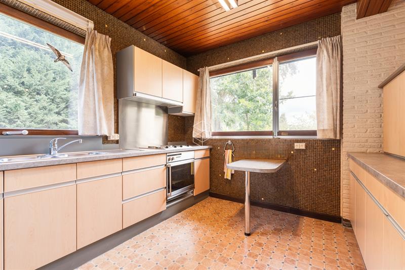 Centraal gelegen gelijkvloerse woning met royale tuin op 1656m² - 13