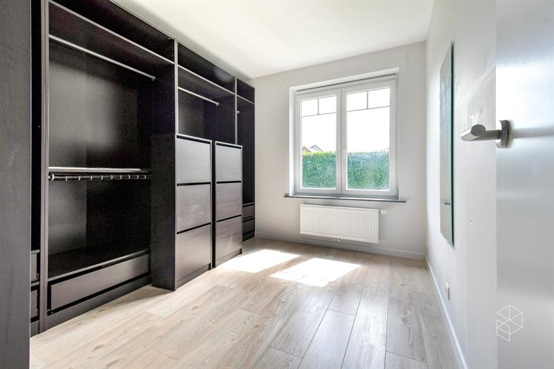Rustig gelegen groot gelijkvloers appartement met 2 slaapkamers, voor- én achtertuin met terras - 12