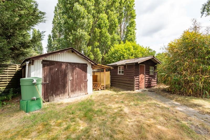 Centraal gelegen gelijkvloerse woning met royale tuin op 1636m² - 21