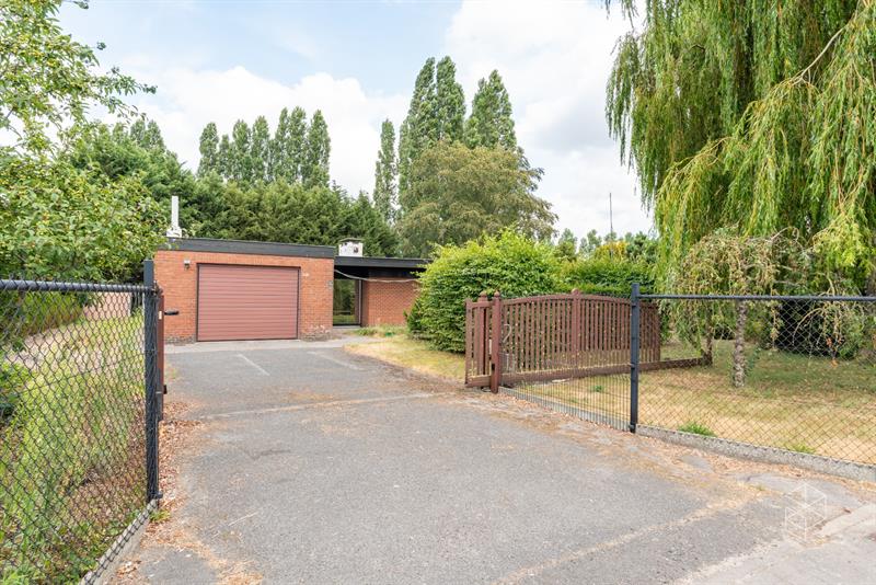 Centraal gelegen gelijkvloerse woning met royale tuin op 1636m² - 2
